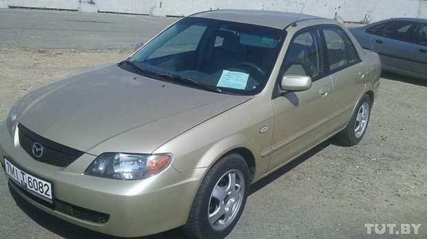 Mazda 323 2003 ..  - 5950